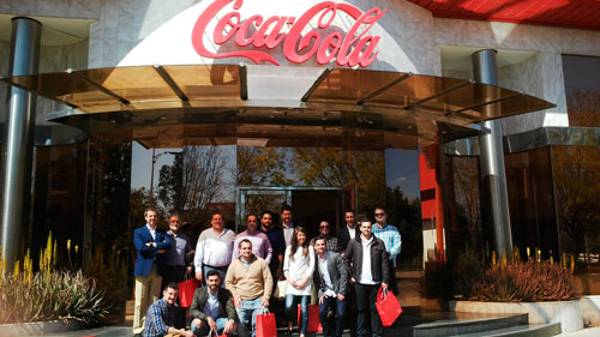 Las franquicias Cien Boca-Pizz visitan la fábrica de Coca Cola en Sevilla